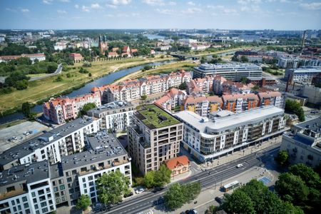 Inwestycja Kapitanat Garbary w Poznaniu: mieszkania, które zawisną nad zabytkowym budynkiem